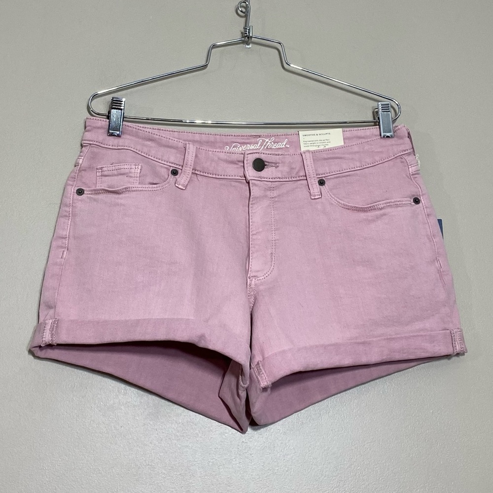Universal Tread || woman’s mid rise pink shorts 
 size 10/30